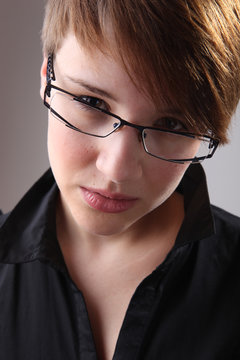 Portrait of a beautiful girl in glasses