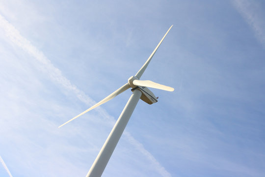 Windmill against blue sky