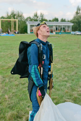 The parachutist after a landing looks in the sky