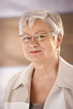 Portrait of elderly woman with glasses