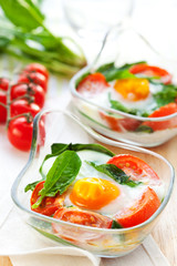 Baked egg with tomatoes and spinach