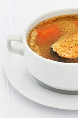 Fish soup a white plate white