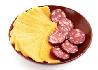 Sausage and cheese on plate isolated on white