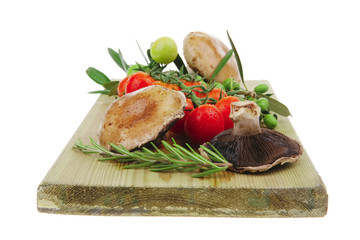 vegetables served on wooden board
