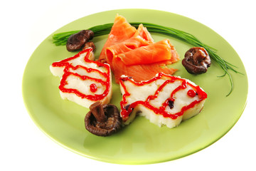 red salmon with mash on green