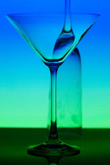 a conceptually illuminated glasses on gradient background