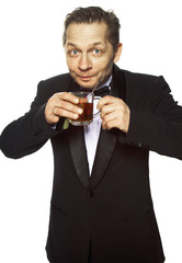 An elegant woman drinking tea