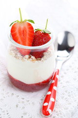 Yogurt with jam and fresh strawberry