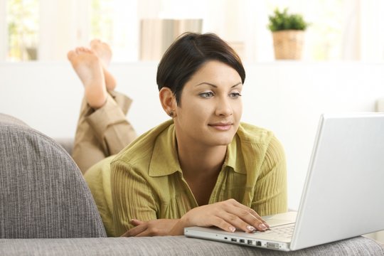 Attractive woman using laptop
