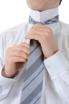 Businessman Tying His Tie