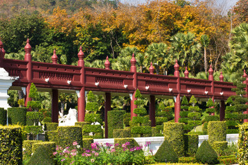Red wooden bridge in the garden