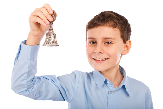 Child Ringing A Bell