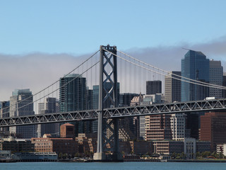 San Francisco Bay Bridge Tower with the City Skyline in the back