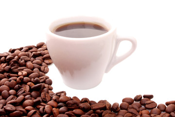 Small white cup of coffee with coffee grain on grain background