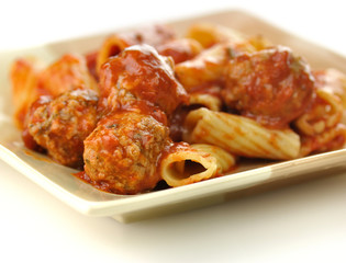Rigatoni with tomato sauce and meatballs.
