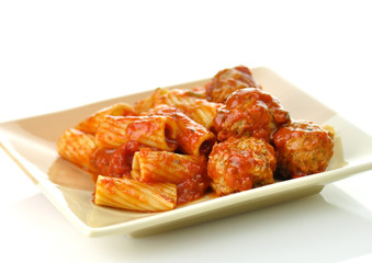 Rigatoni with tomato sauce and meatballs.