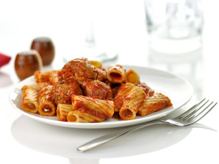 Rigatoni with tomato sauce and meatballs.