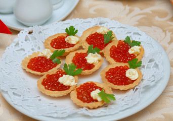 Tartlet with red caviar   .