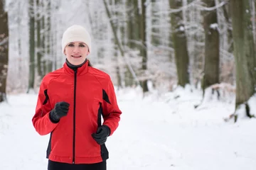 Foto auf Acrylglas Wintersport Jogging in winter