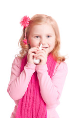 girl spraying her nose with nasal spray