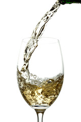 White wine pouring into glass