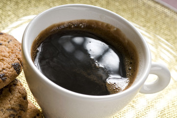 Coffee cup and chocolate cookies