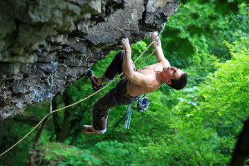 Rock climber on route
