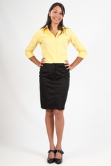Fototapeta premium Beautiful young woman in business blouse and skirt