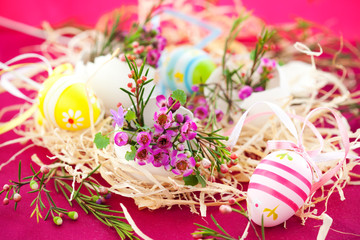 Pink flowers in eggshells