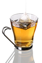 Cup of tea with pyramid teabag (clipping path included)