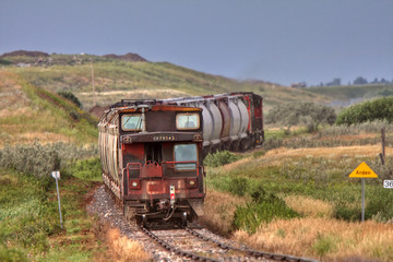 Fototapeta na wymiar Old caboose on Saskatchewan railroad branch line
