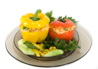 Yellow pepper and red tomato stuffed with vegetable salad