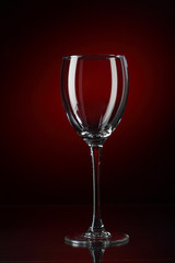 glass of red wine on black background