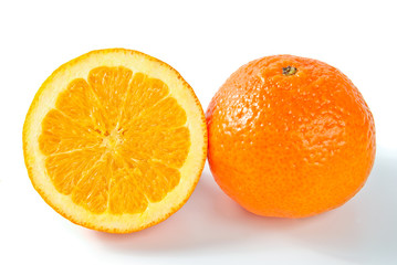Full and half of orange over white