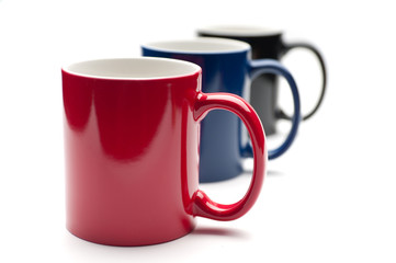 three colorful cups