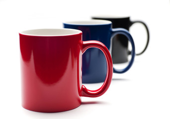 three colorful cups