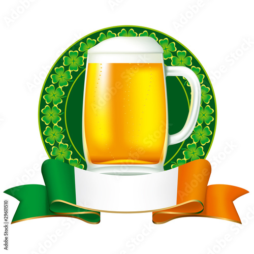 “A mug of beer with Irish flag and clover ornament.” Stock image and