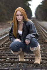 Girl on tracks
