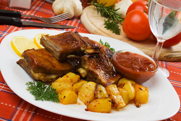 Barbecued ribs with baked potato
