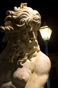 Vienna - statue of god in the night - mythology