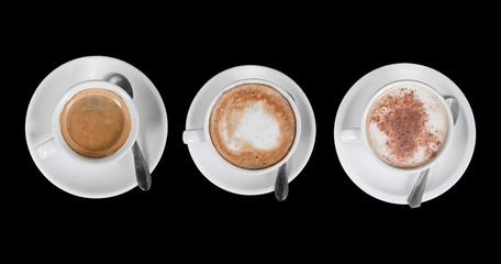 coffe cups from the top isolated over a dark background