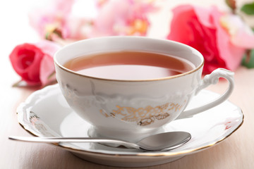 cup of tea and roses