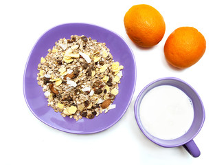 Museli, milk and oranges
