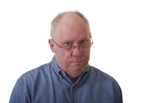 Older Balding Guy in Glasses Skeptical
