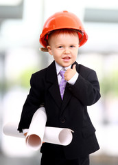 Adorable future architect over a white background.