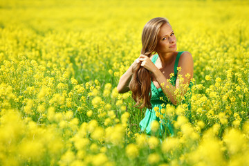 woman on oilseed field
