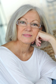 Portrait Of Senior Woman Wearing Eyeglasses