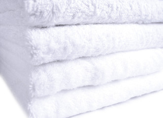 Stack of white towels close up