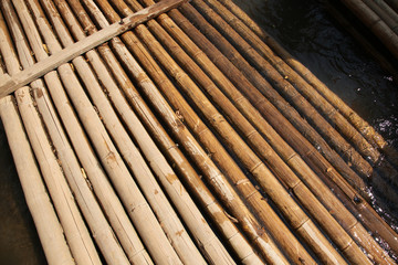 Bamboo rafting vehicle in the river.