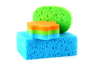 Color sponges on white background
